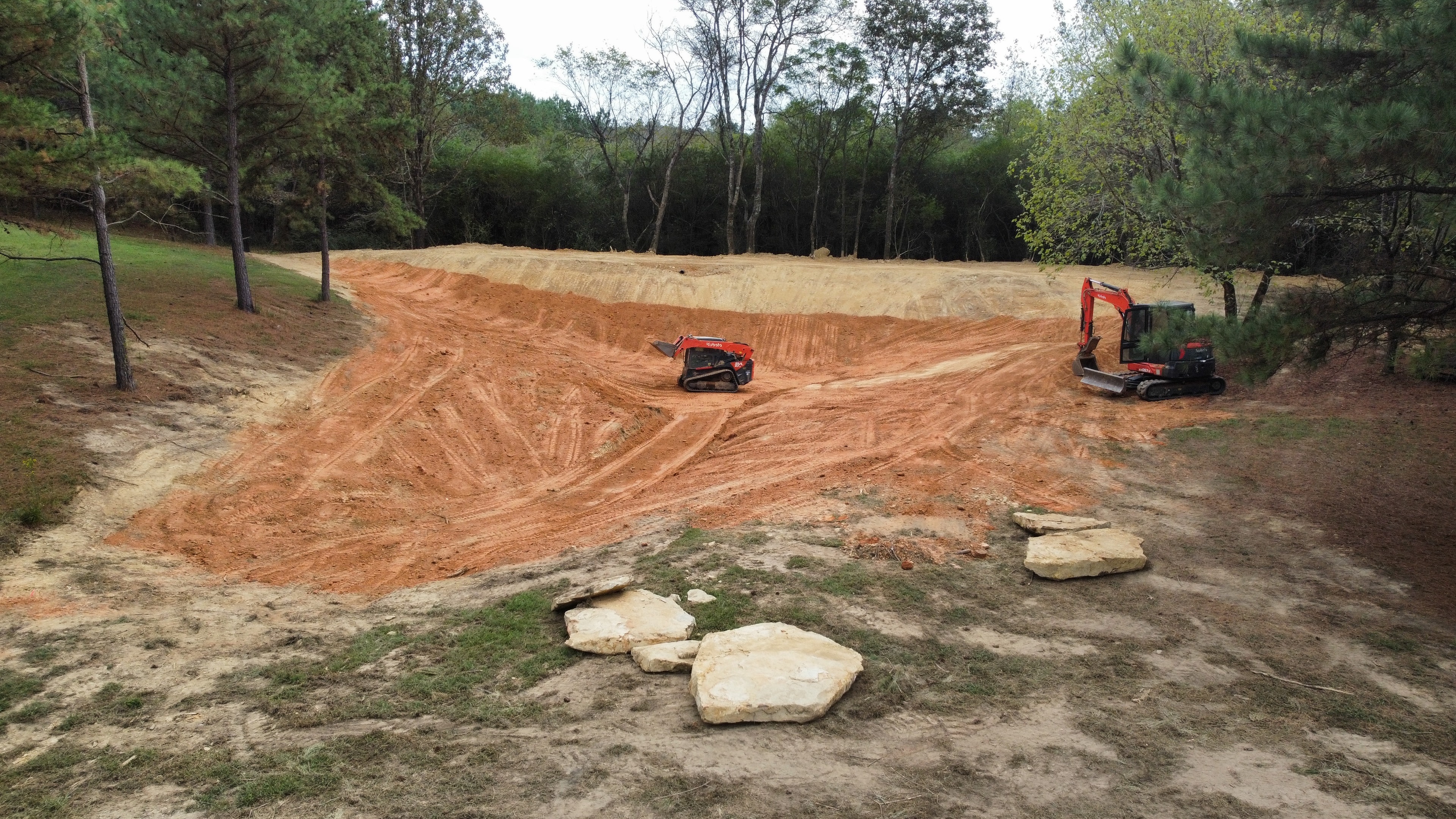 Aerial view of construction equipment grading site