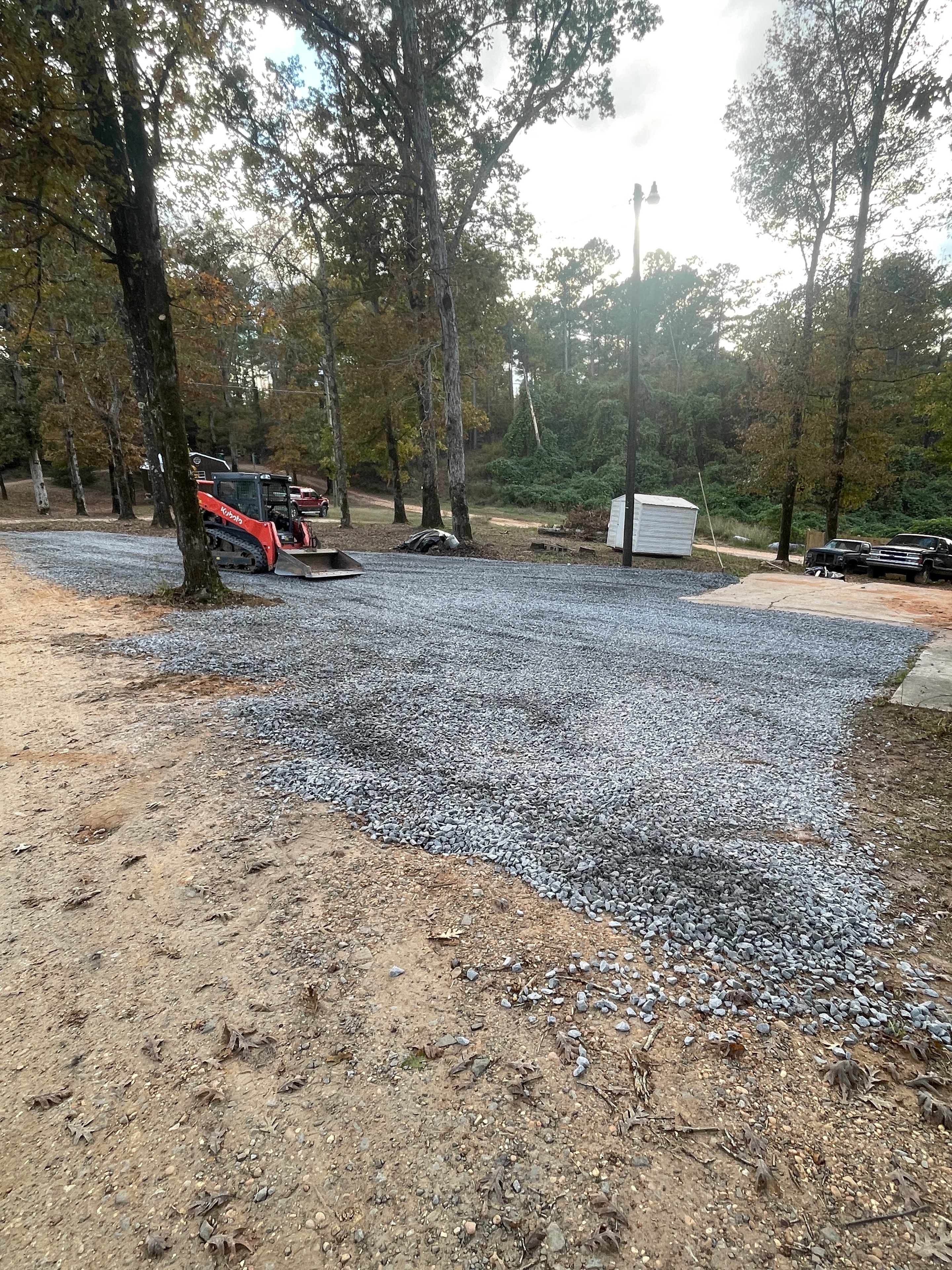 Gravel driveway construction through forest